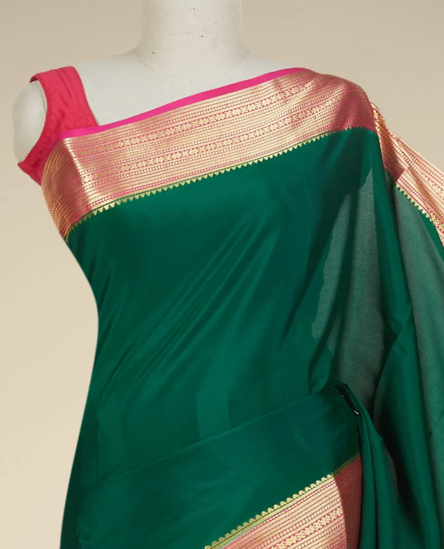 Green plain design mysore silk saree, contrast traditional zari border & pallu of zari stripes
